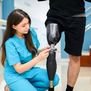 physiotherapist-adjusting-prosthetic-leg